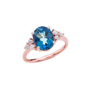 White Topaz & Blue Topaz Winged Gemstone Ring in 9ct Rose Gold