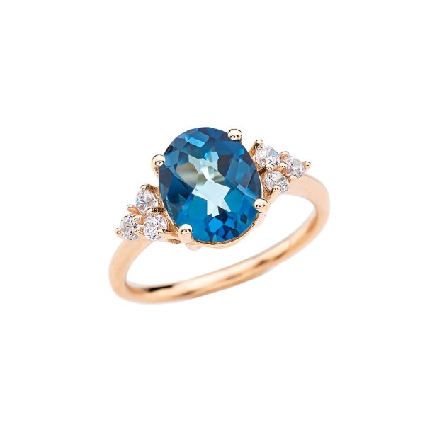 White Topaz & Blue Topaz Winged Gemstone Ring in 9ct Gold