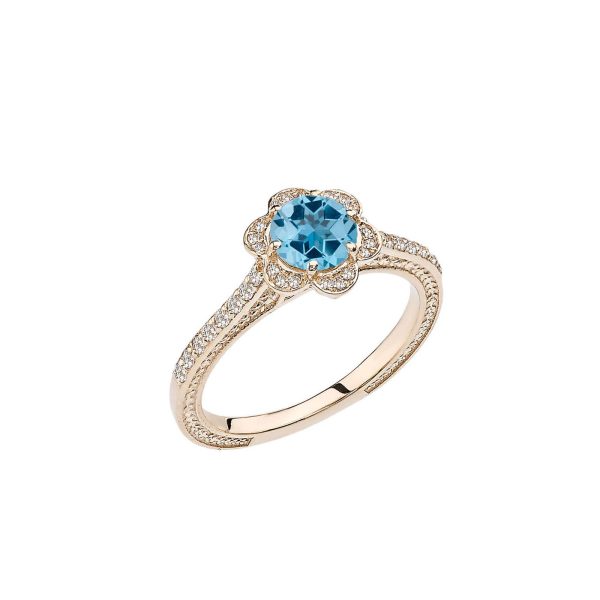 Blue Topaz Art Deco Halo Ring in 9ct Gold